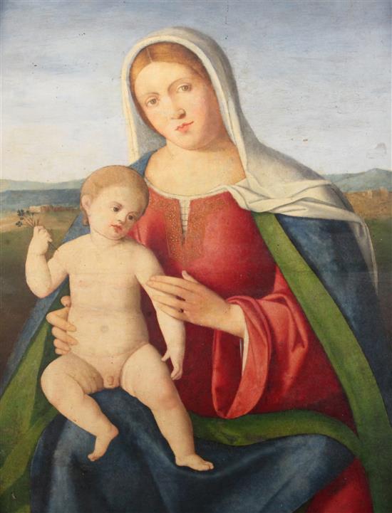 Circle of Francia (Francesco di Marco Raibolini) (1450-1517) Madonna and Child with a landscape beyond 27.5 x 18.5in.